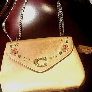 Pink coach shoulder purse leather on inside and out